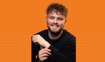 Headshot of student Luis Mutch over an orange background