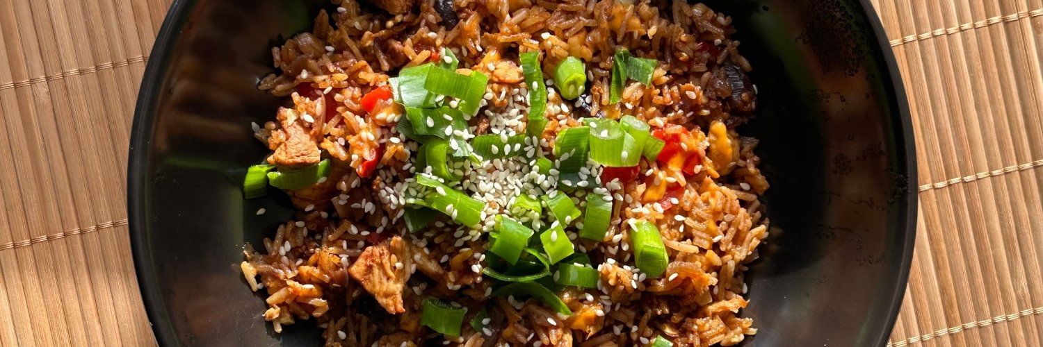 A bowl of chicken fried rice