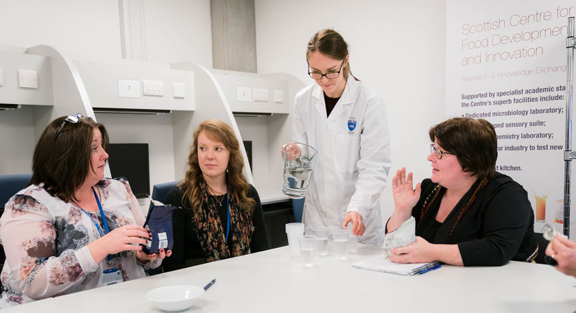 image of people in a food test panel session
