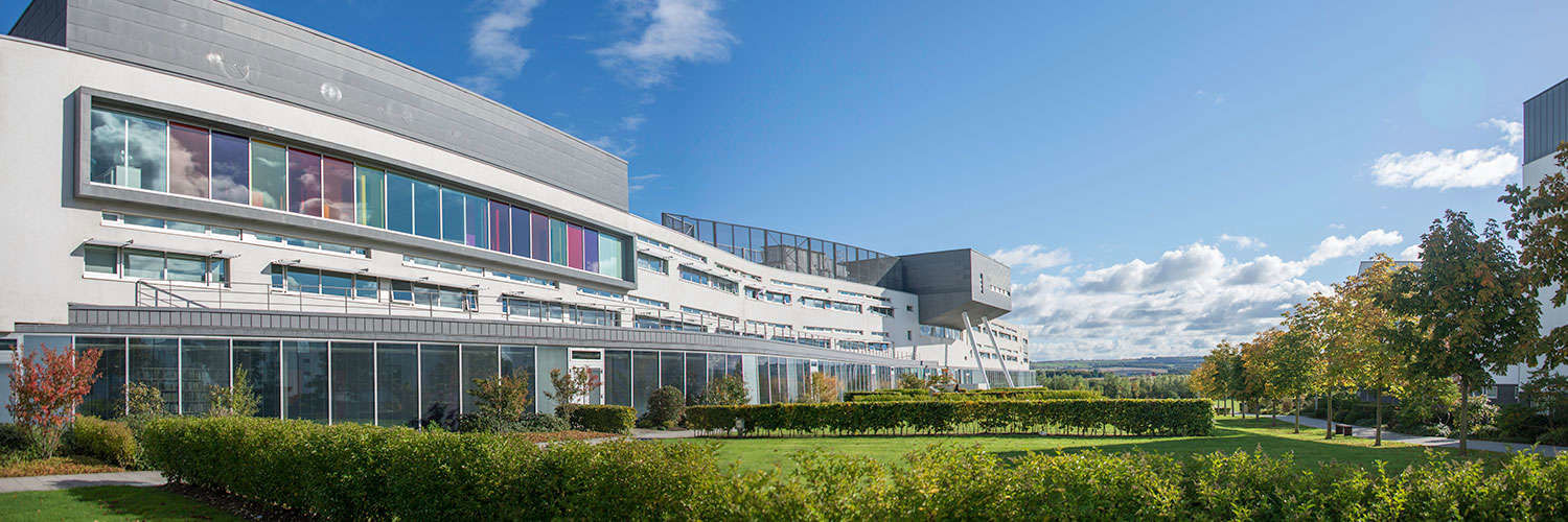 Panoramic view of campus building and grounds