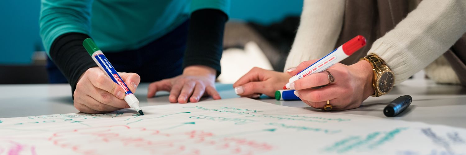Students brainstorming on paper