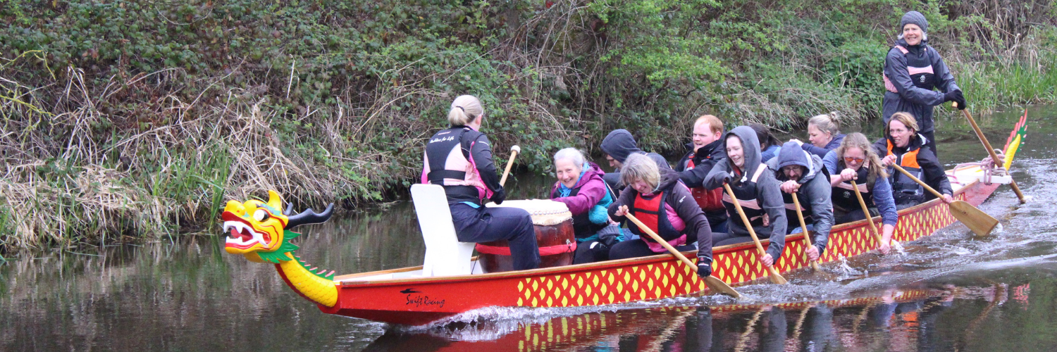 QMU students and the Port Edgar Dragons rowing in the Dragonboat
