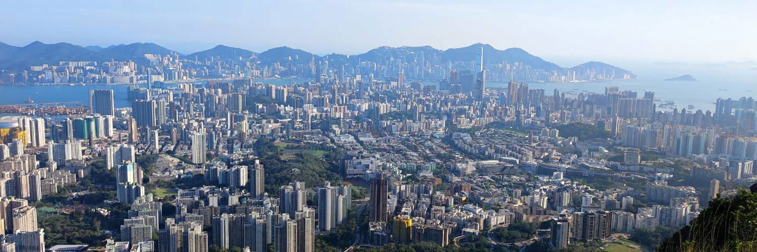 An aerial view of Hong Kong, the landscape filled with skyscrapers.
