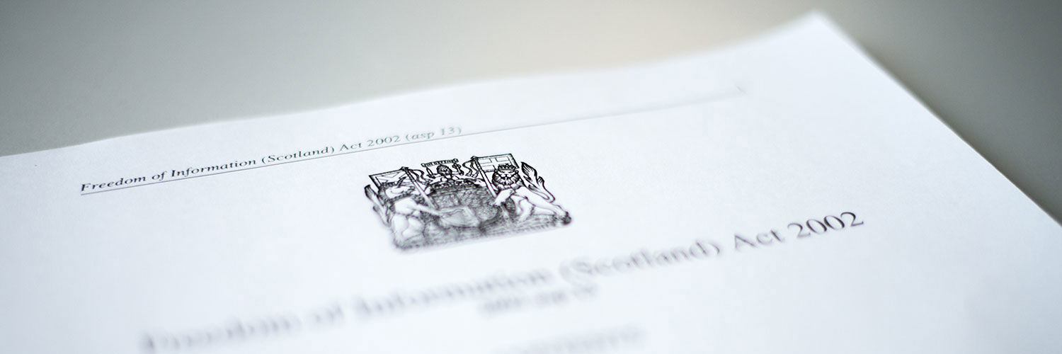 Close up of the HM Government logo and "Freedom of Information (Scotland) Act 2002"