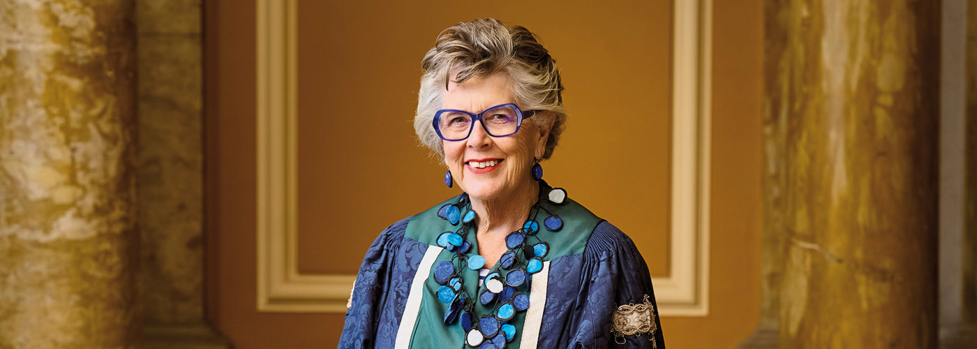 Photo of Dame Prue Leith CBE in graduation gown after recieving Honorary Degree from Queen Margaret University