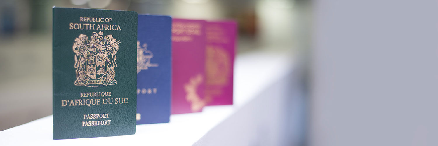 A row of different passports from different countries