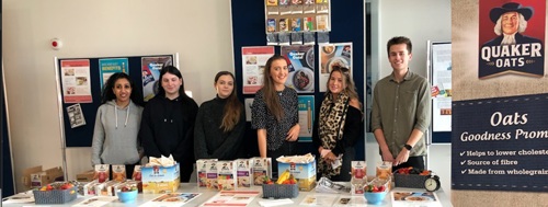 Alistair and his peers running a Quaker Oats stall at QMU