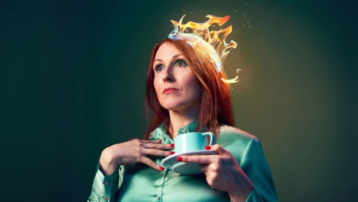 Woman with hair on fire, holding tea cup. Poster for 'Troubled' fringe show