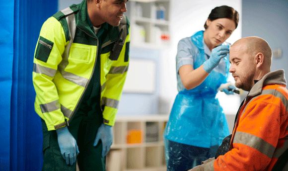 Nurse tending to a minor head injury