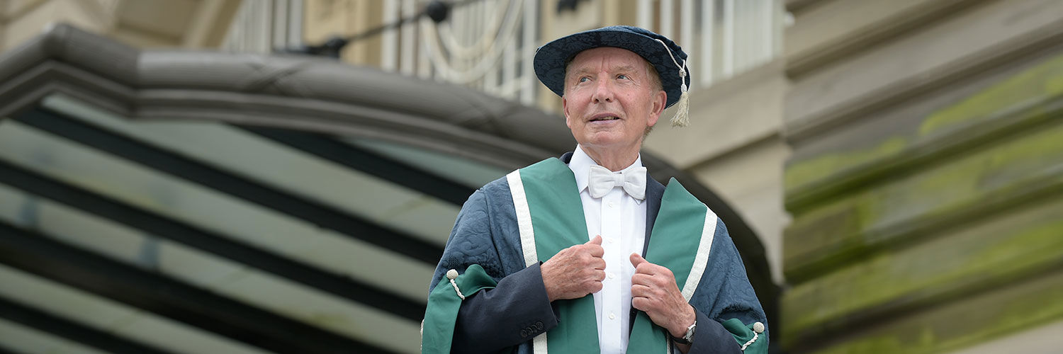Photo of Sir Tom Farmer at one of QMU graduation