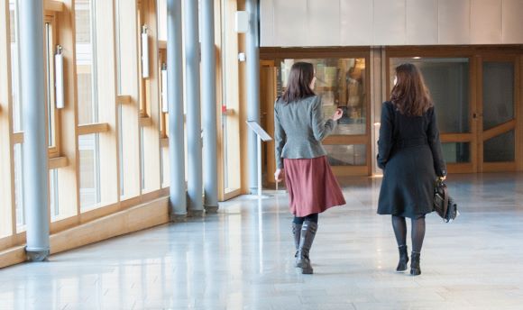 Women walking down corridor in Scottish parliament building