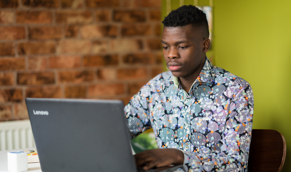 Prospective Student using laptop