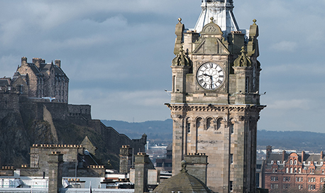 Balmoral Hotel clock tower on a cloudy day, Edinburgh city centre