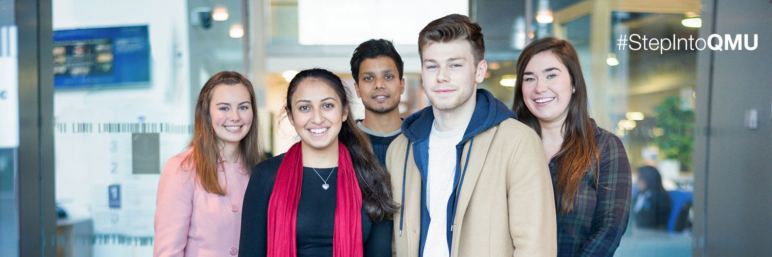 A photo of a group of QMU students looking directly at the camera and smiling