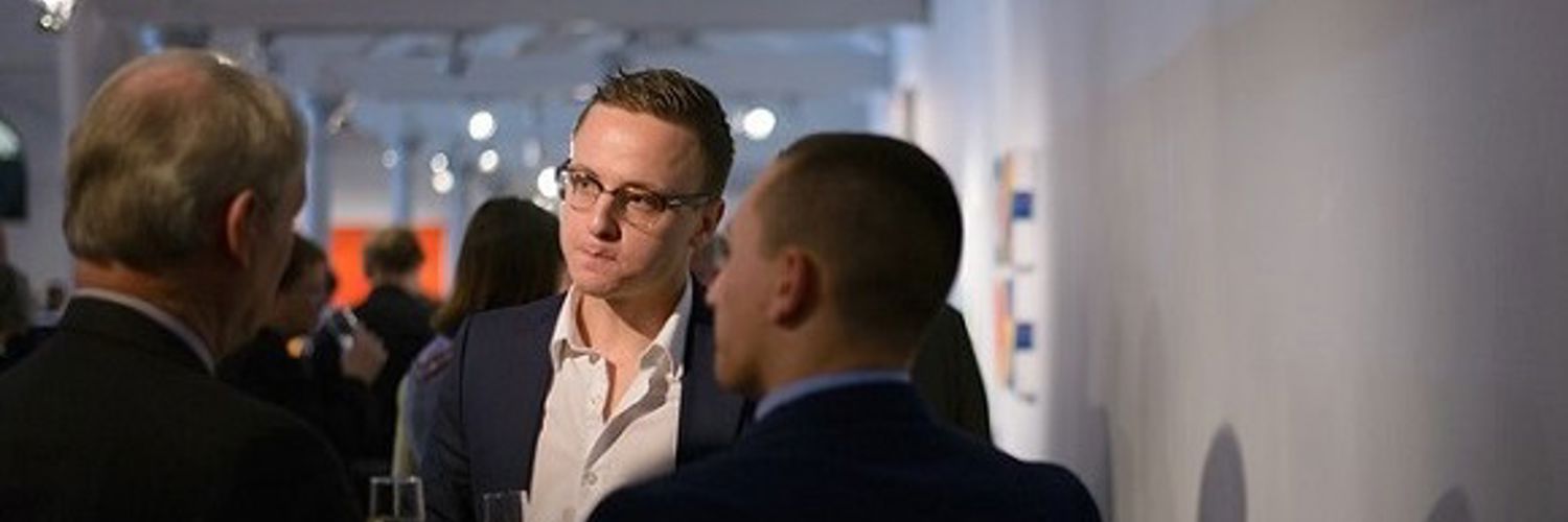 A QMU student networking with professionals at Dovecot Studio Edinburgh