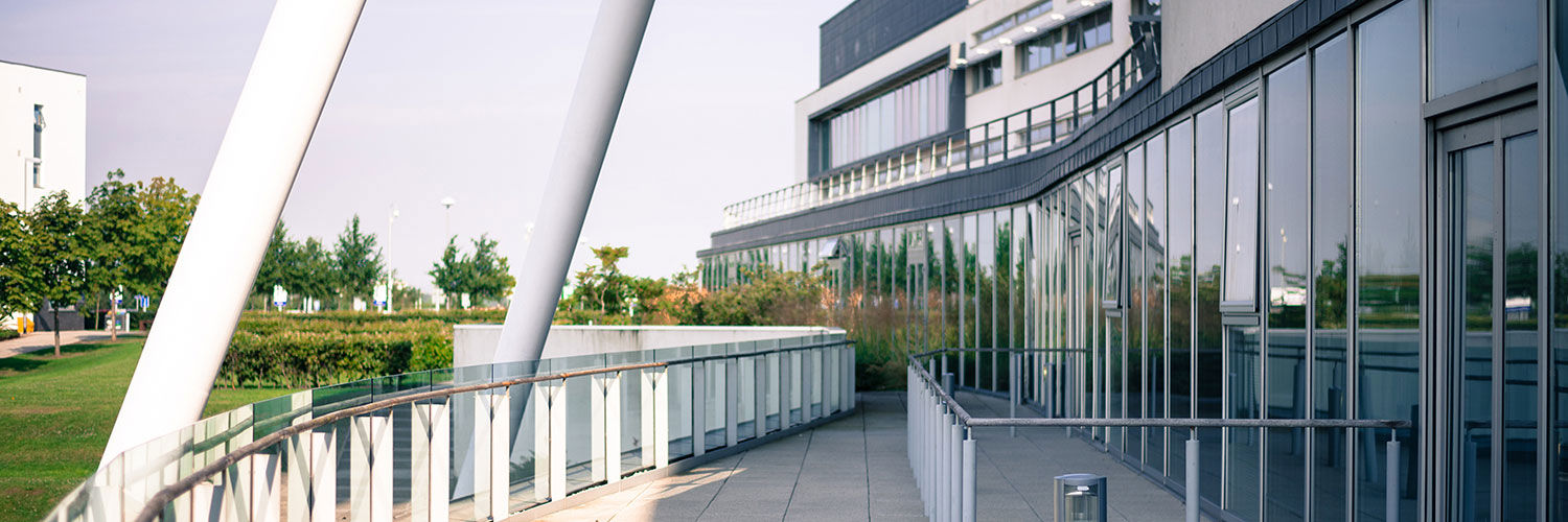 Glass panelled wall of Queen Margaret University Campus, taken from the patio area