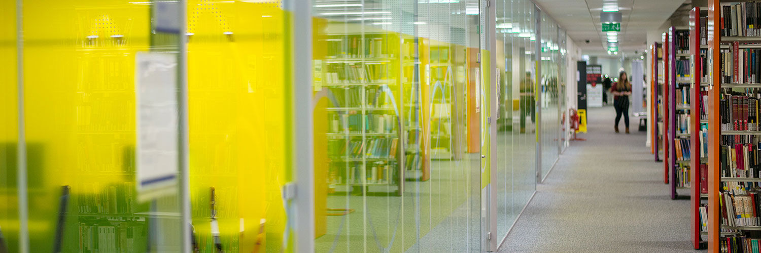 A corridor of modern study rooms at Queen Margaret University, Edinburgh
