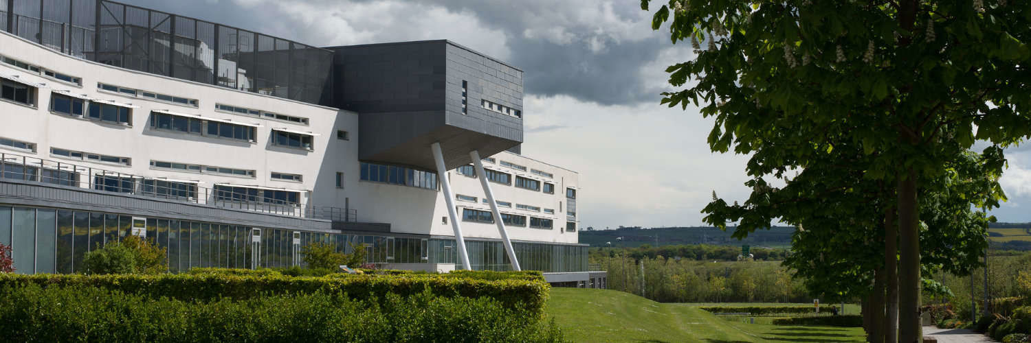 A panoramic shot of Queen Margaret University campus on a cloudy day