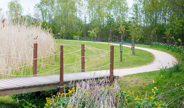 View of a footpath in Queen Margaret University Campus surrounded by trees