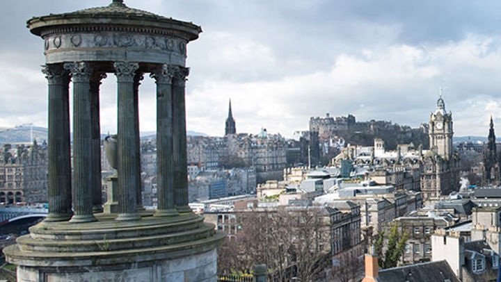 The Dugald Stewart Monument with the city scape sprawling into the distance, Edinburgh