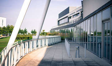 Glass panelled wall of Queen Margaret University Campus, taken from the patio area