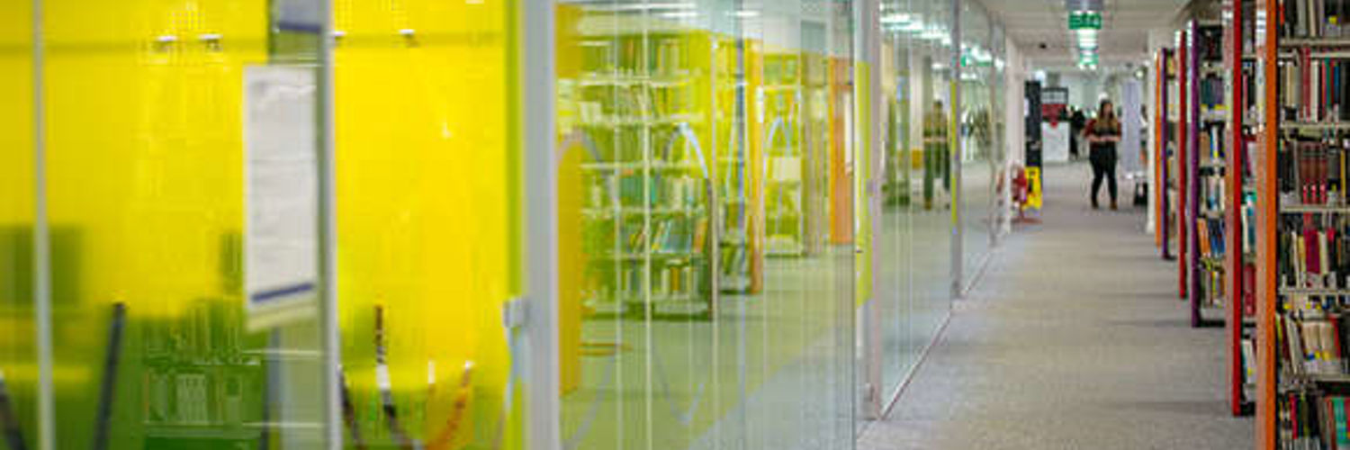 A corridor of modern study rooms at Queen Margaret University, Edinburgh