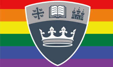 The QMU shield in front of the LGBTQ+ flag