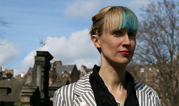 Ever Dundas close up portrait, blonde woman with dyed blue fringe