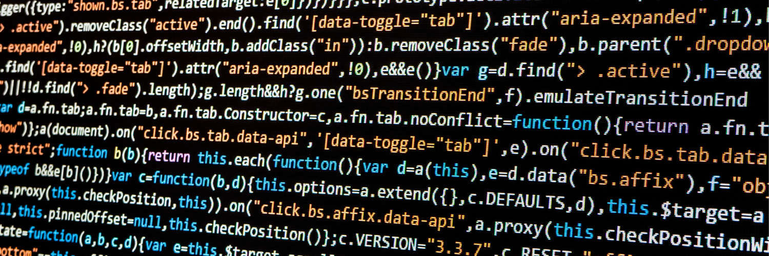Close up image of a computer screen full of website coding