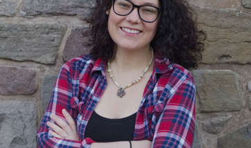 Portrait of Emma Bathgate smiling at the camera