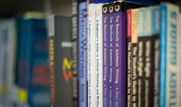 Close up of a row of books in the QMU library