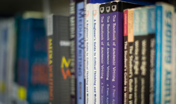 Close up of a row of books in the QMU library