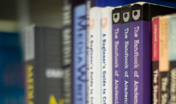 Close up of a row of books in the QMU library
