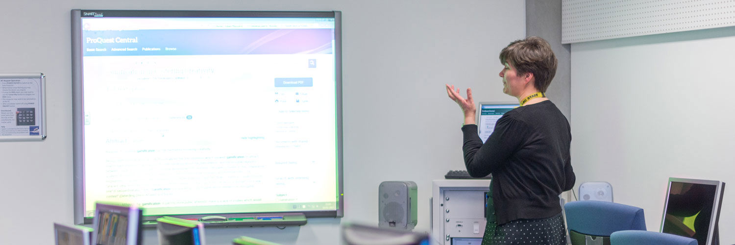 Close up of a lecturer teaching a class at QMU, Edinburgh