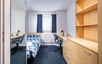 A neat and tidy unoccupied room at QMU student accommodation