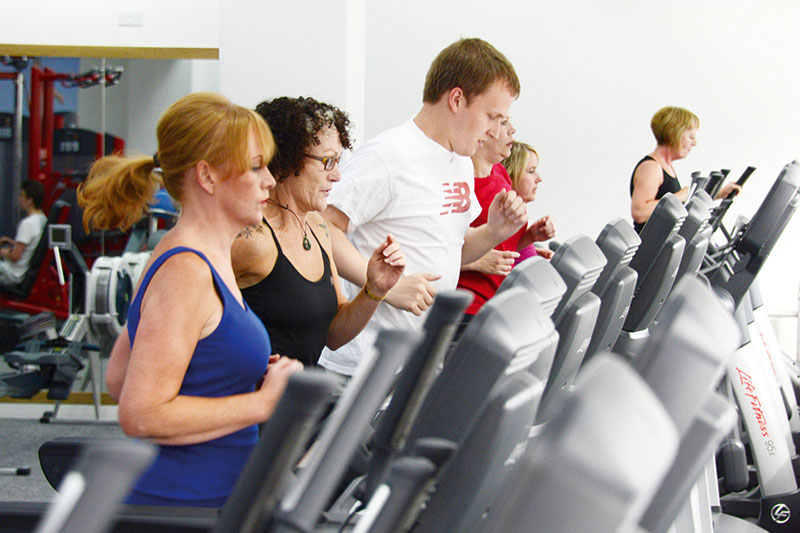A line of treadmills in use in the Queen Margaret University Sports Centre