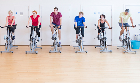 A busy spin class in session in the QMU sports centre