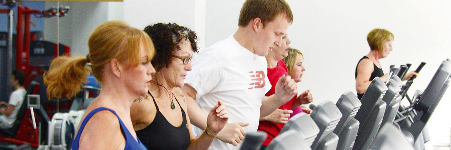 A line of treadmills in use in the Queen Margaret University Sports Centre