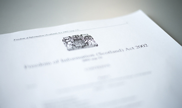 Close up of the HM Government logo and "Freedom of Information (Scotland) Act 2002"