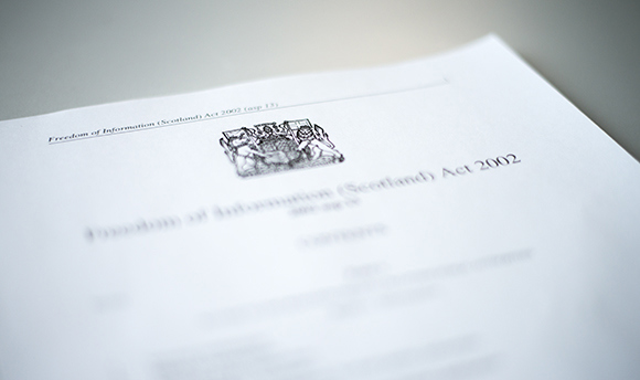 Close up of the HM Government logo and "Freedom of Information (Scotland) Act 2002"