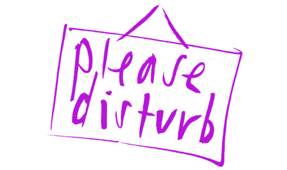 A handwritten sign 'Please Disturb'