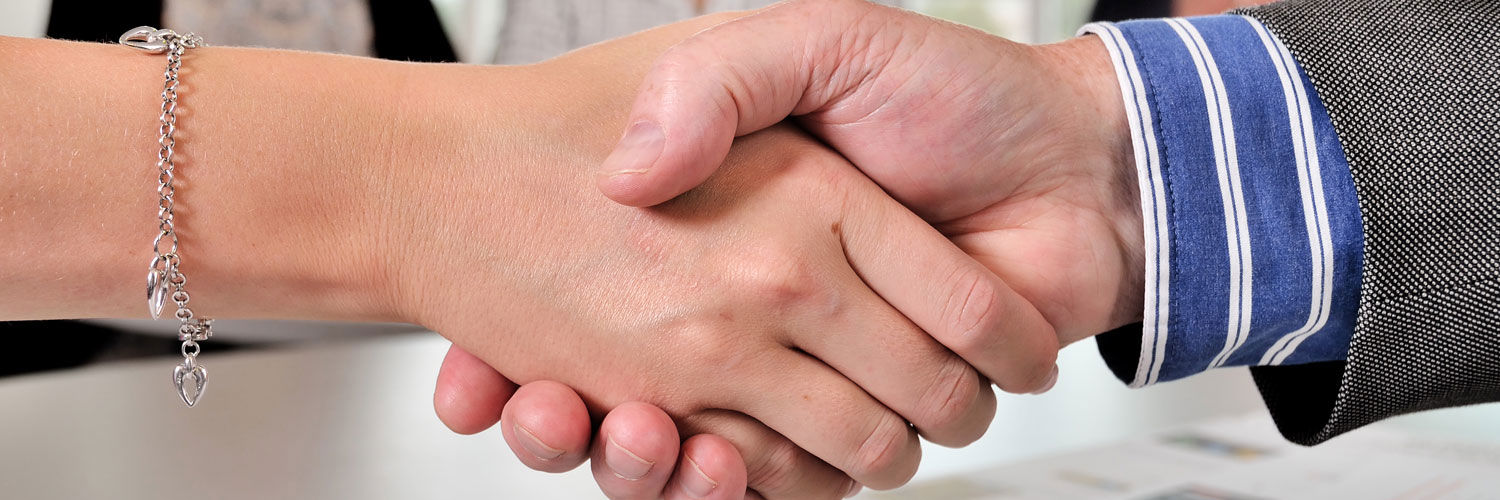 Close up of a pair of shaking hands