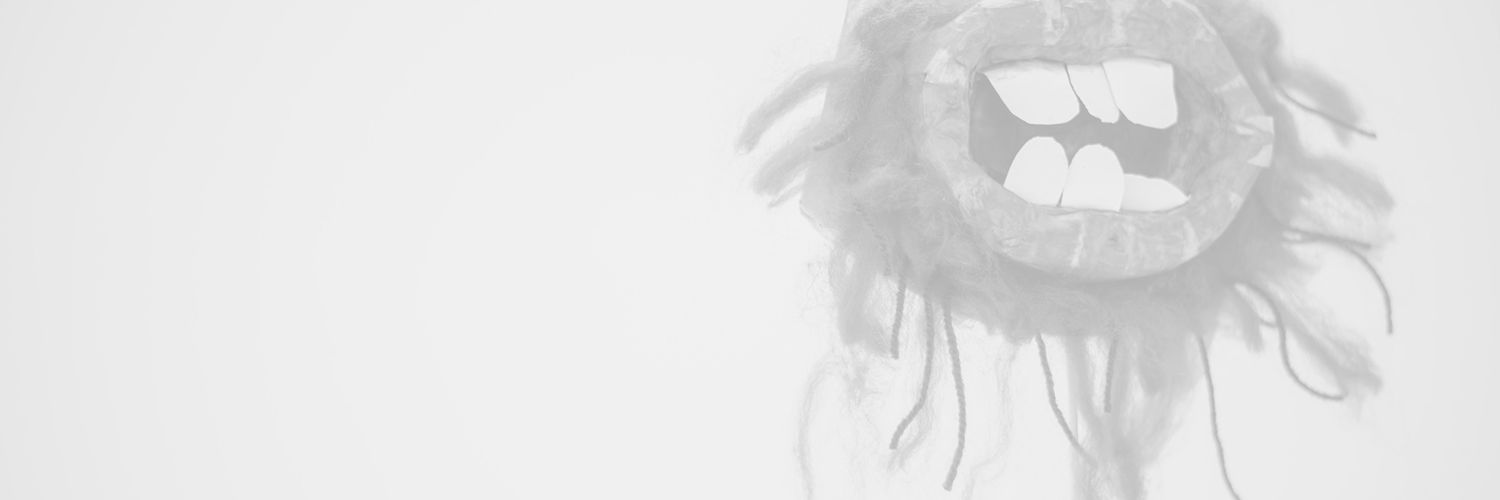 Faded image of a surreal painting of an open mouth with crooked teeth 