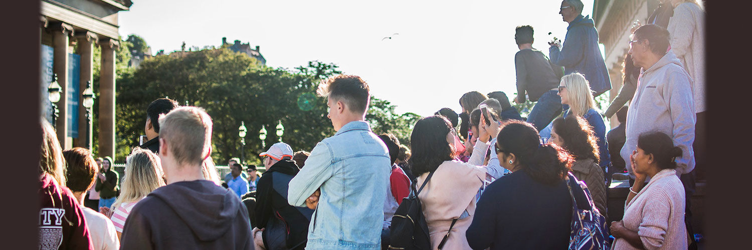 A crowd of people on Princes street, Edinburgh city centre