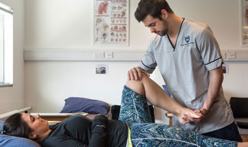Queen Margaret physiotherapy student treating a patient