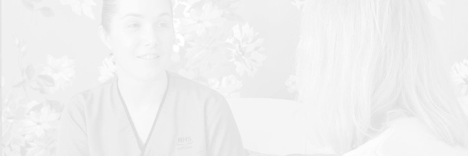 Faded image of A student nurse talking to a patient