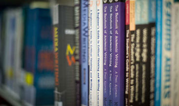 Close up of a row of books in the QMU library
