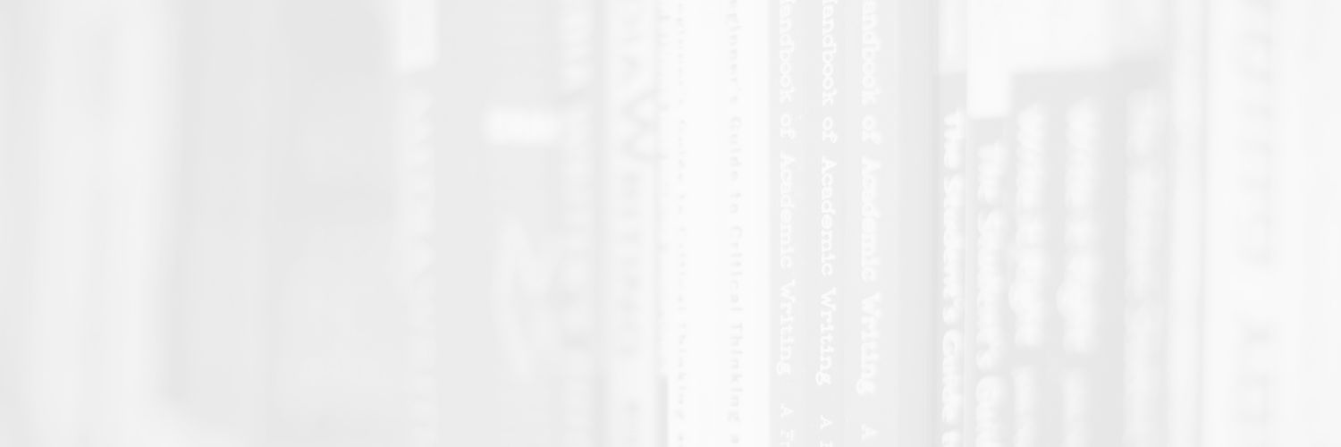 Faded image of a close up of a row of books in the QMU library