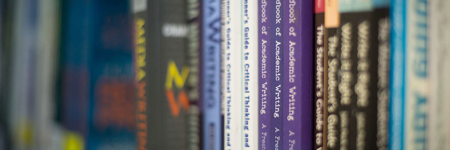 Close up of a row of books in the QMU library