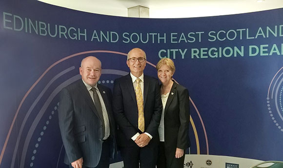 Malcom Cutt posing with representatives from Edinburgh City Region Deal